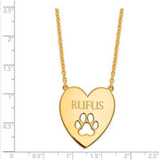 Gold Plated Sterling Silver Heart with Dog Paw Print Necklace. The pendant is shown on a ruled background.