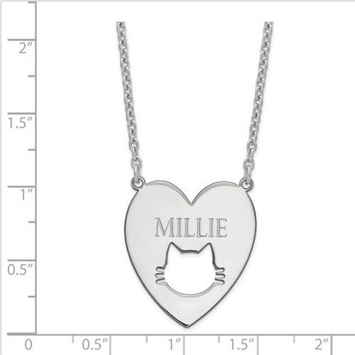 Sterling Silver Rhodium-plated Heart with Cat Face Necklace. The pendant is shown on a ruled background.