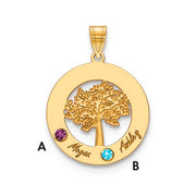 The Circle Pendant With 2 Birthstones is a quality gold accessory featuring a detailed tree in the center. It includes two colored gems: one purple (A) and one blue (B). "Megan" is engraved next to gem A, while "Ashley" is engraved next to gem B. This birthstone pendant has a loop at the top for attaching to a necklace chain.