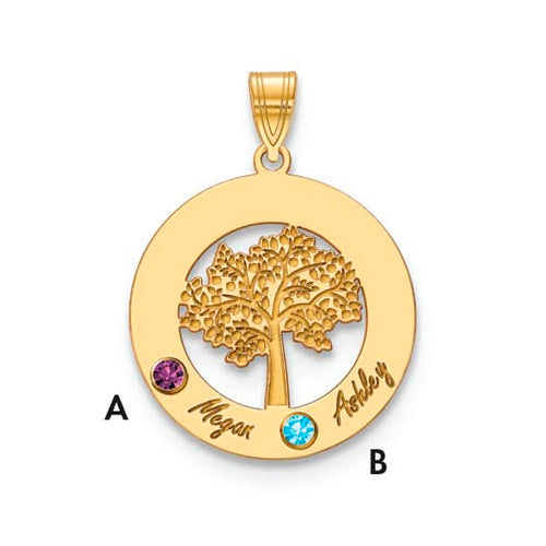 The Circle Pendant With 2 Birthstones is a quality gold accessory featuring a detailed tree in the center. It includes two colored gems: one purple (A) and one blue (B). "Megan" is engraved next to gem A, while "Ashley" is engraved next to gem B. This birthstone pendant has a loop at the top for attaching to a necklace chain.