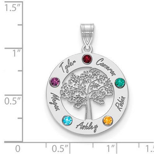 Product Description: The Circle Pendant With 5 Birthstones is a stunning silver piece featuring a circular design with a tree cut-out at its center. This exquisite piece of jewelry showcases five birthstones.  The pendant is shown on a ruled background.