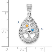 Introducing the Family Tree Teardrop Silver Pendant with 2 Birthstone: This elegant piece features an intricate tree of life design, with its branches weaving through the pendant's edge. The pendant is shown on a ruled background.