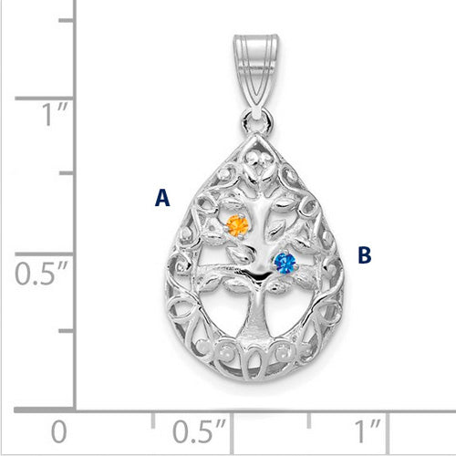 Introducing the Family Tree Teardrop Silver Pendant with 2 Birthstone: This elegant piece features an intricate tree of life design, with its branches weaving through the pendant's edge. The pendant is shown on a ruled background.