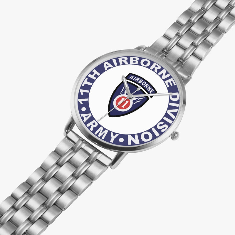 11th Airborne Division Silvertone Watch is displayed in a perspective view on a white background with the silver metal strap stretched out.