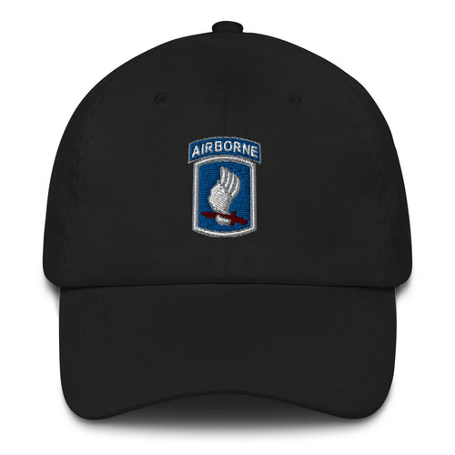 A black 173rd Airborne Brigade Hat with the logo on the front.  The hat has a curved visor and an adjustable strap at the back.