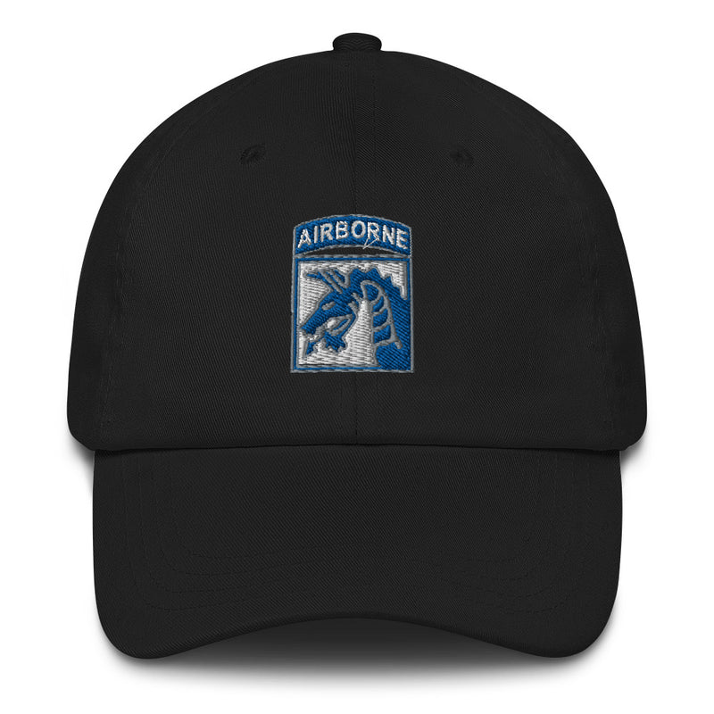 A black XVIII Airborne Corps Hat with the logo on the front.  The hat has a curved visor and an adjustable strap at the back.