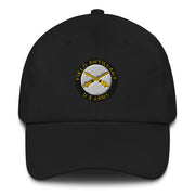 A black US Army Field Artillery Hat with the logo on the front.  The hat has a curved visor and an adjustable strap at the back.