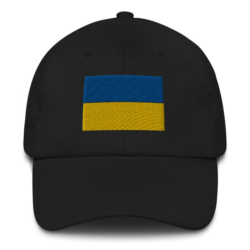 A black Ukrainian Flag Hat with the logo on the front.  The hat has a curved visor and an adjustable strap at the back.