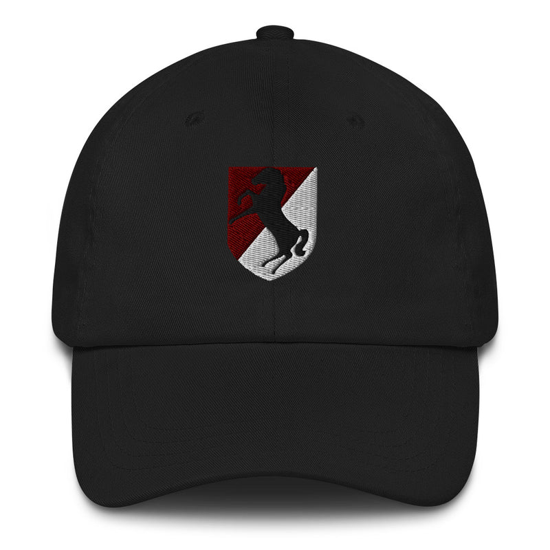 A black 11th Armored Cavalry Regiment Hat with the logo on the front.  The hat has a curved visor and an adjustable strap at the back.