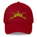 A cranberry colored Army Armor Hat with the logo on the front.  The hat has a curved visor and an adjustable strap at the back.