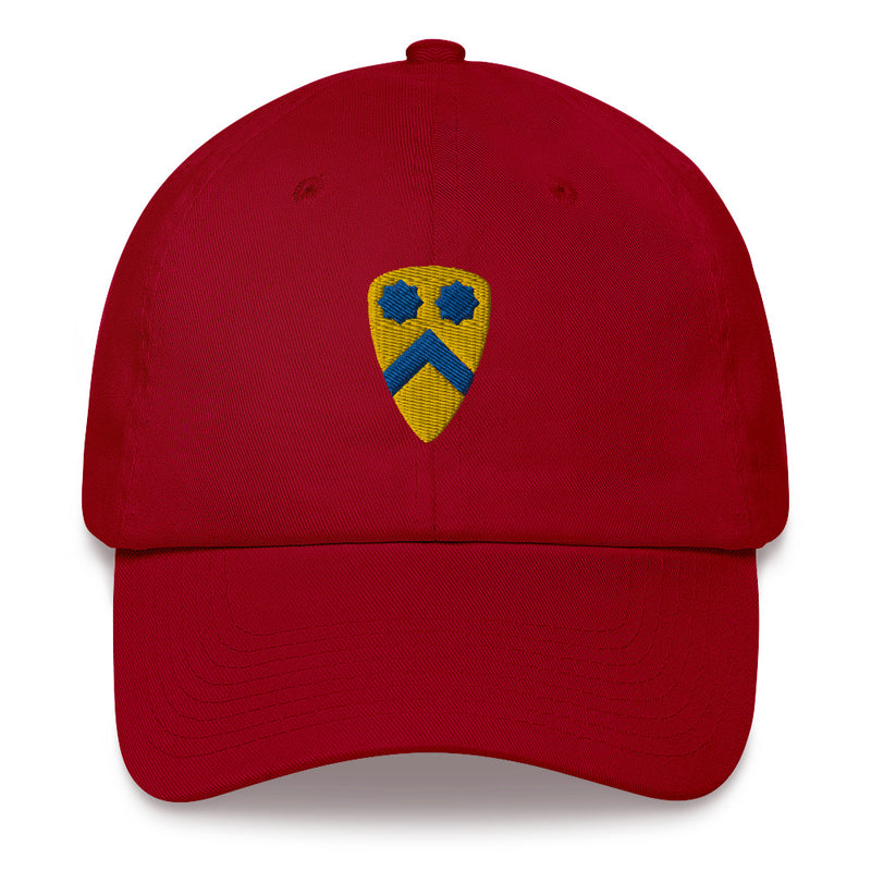A cranberry colored 2nd Cavalry Division Hat with the logo on the front.  The hat has a curved visor and an adjustable strap at the back.