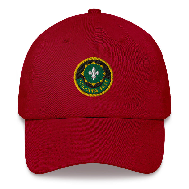 A cranberry colored 2nd-cavalry-regiment Hat with the logo on the front.  The hat has a curved visor and an adjustable strap at the back.