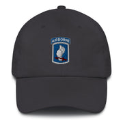 A dark grey 173rd Airborne Brigade Hat with the logo on the front.  The hat has a curved visor and an adjustable strap at the back.
