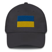 A dark grey Ukrainian Flag Hat with the logo on the front.  The hat has a curved visor and an adjustable strap at the back.
