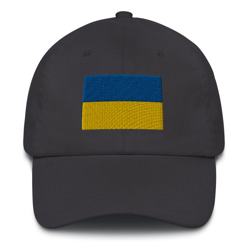 A dark grey Ukrainian Flag Hat with the logo on the front.  The hat has a curved visor and an adjustable strap at the back.