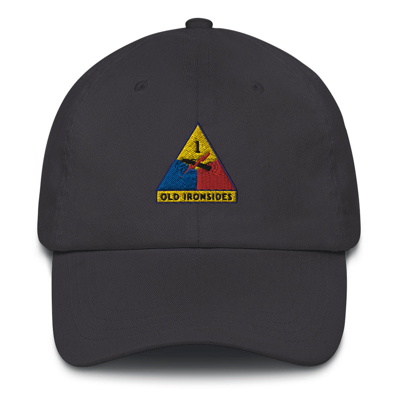 A dark grey 1st Armored Division Hat with the logo on the front.  The hat has a curved visor and an adjustable strap at the back.