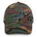 A military style Senior Parachutist Division Hat with camouflage and the logo on the front.  The hat has a curved visor and an adjustable strap at the back. 