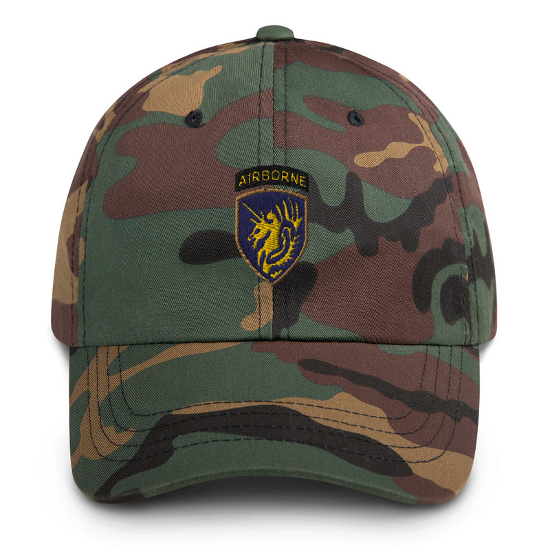 A military style 13th Airborne Division Hat with camouflage and the logo on the front.  The hat has a curved visor and an adjustable strap at the back. 