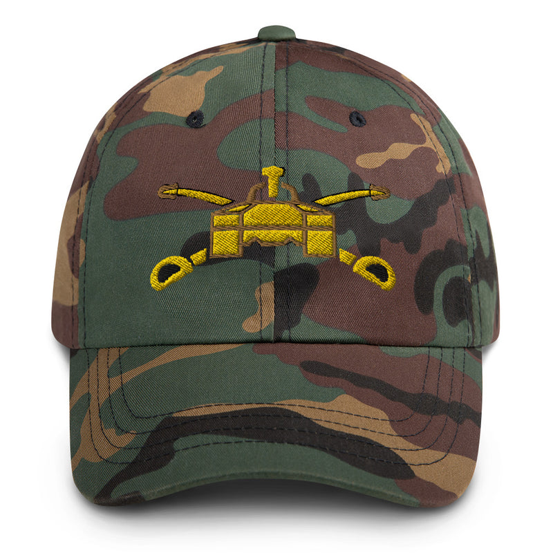 A military style Army Armor Hat with camouflage and the logo on the front.  The hat has a curved visor and an adjustable strap at the back. 