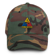 A military style 2nd Armored Division Hat with camouflage and the logo on the front.  The hat has a curved visor and an adjustable strap at the back. 