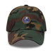 A military style Navy Seabees Hat with camouflage and the logo on the front.  The hat has a curved visor and an adjustable strap at the back. 