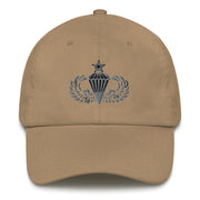 A khaki colored Senior Parachutist Division Hat with the logo on the front.  The hat has a curved visor and an adjustable strap at the back.