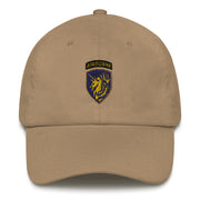 A khaki colored 13th Airborne Division Hat with the logo on the front.  The hat has a curved visor and an adjustable strap at the back.