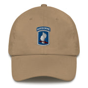 A khaki colored 173rd Airborne Brigade Hat with the logo on the front.  The hat has a curved visor and an adjustable strap at the back.