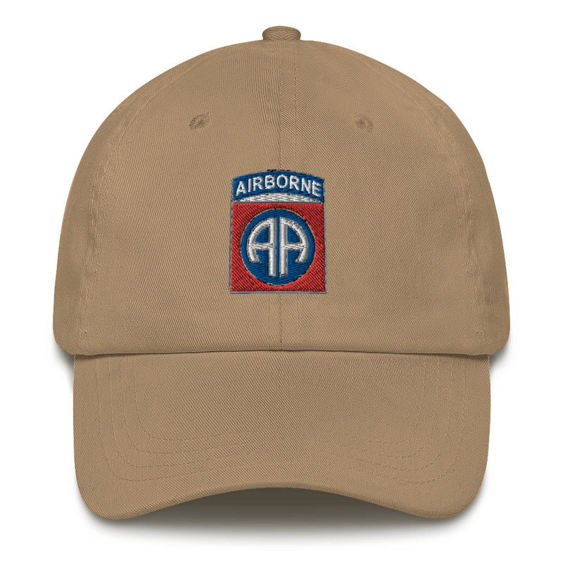 A khaki colored 82nd Airborne Hat with the logo on the front.  The hat has a curved visor and an adjustable strap at the back.