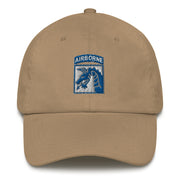 A khaki colored XVIII Airborne Corps Hat with the logo on the front.  The hat has a curved visor and an adjustable strap at the back.