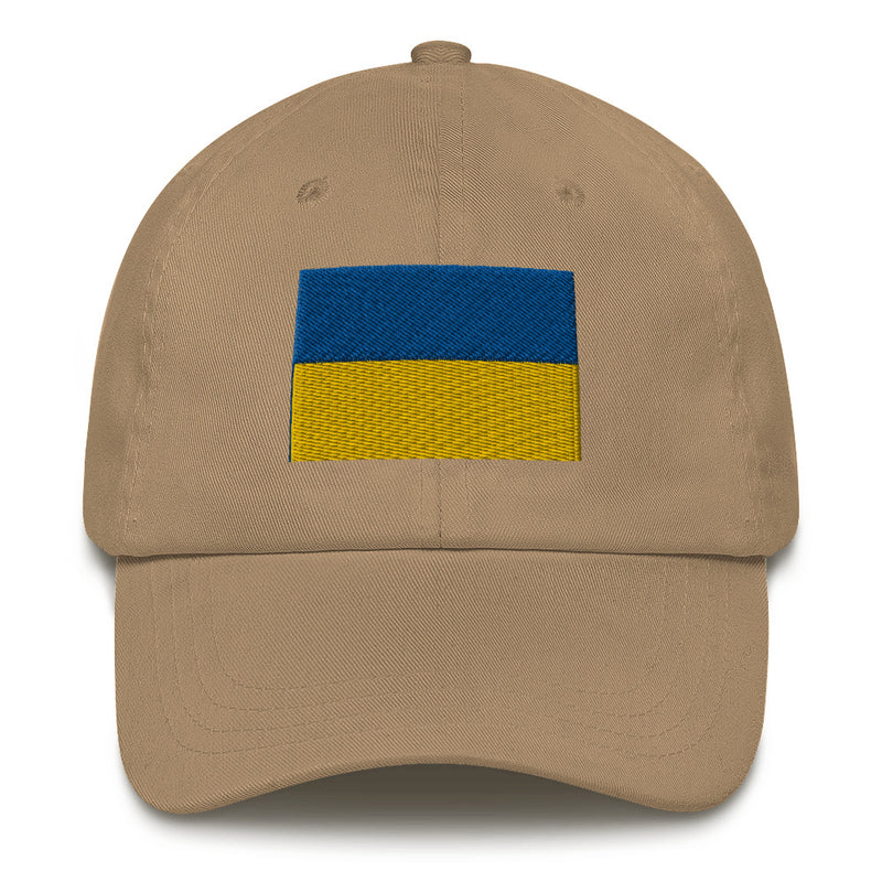 A khaki colored Ukrainian Flag Hat with the logo on the front.  The hat has a curved visor and an adjustable strap at the back.
