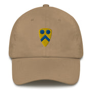 A khaki colored 2nd Cavalry Division Hat with the logo on the front.  The hat has a curved visor and an adjustable strap at the back.