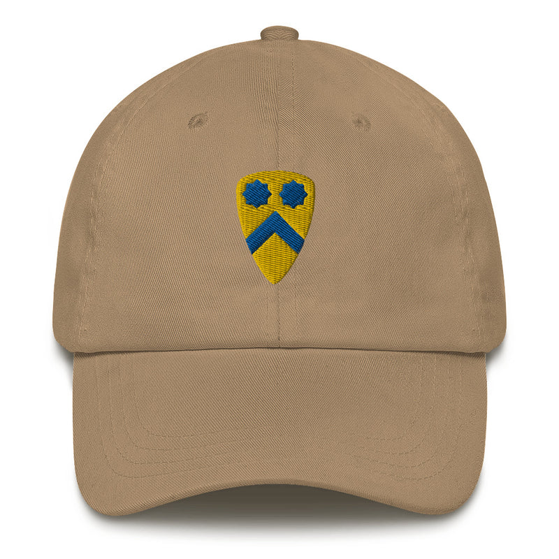 A khaki colored 2nd Cavalry Division Hat with the logo on the front.  The hat has a curved visor and an adjustable strap at the back.