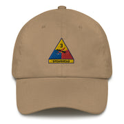 A khaki colored 3rd Armored Division Hat with the logo on the front.  The hat has a curved visor and an adjustable strap at the back.