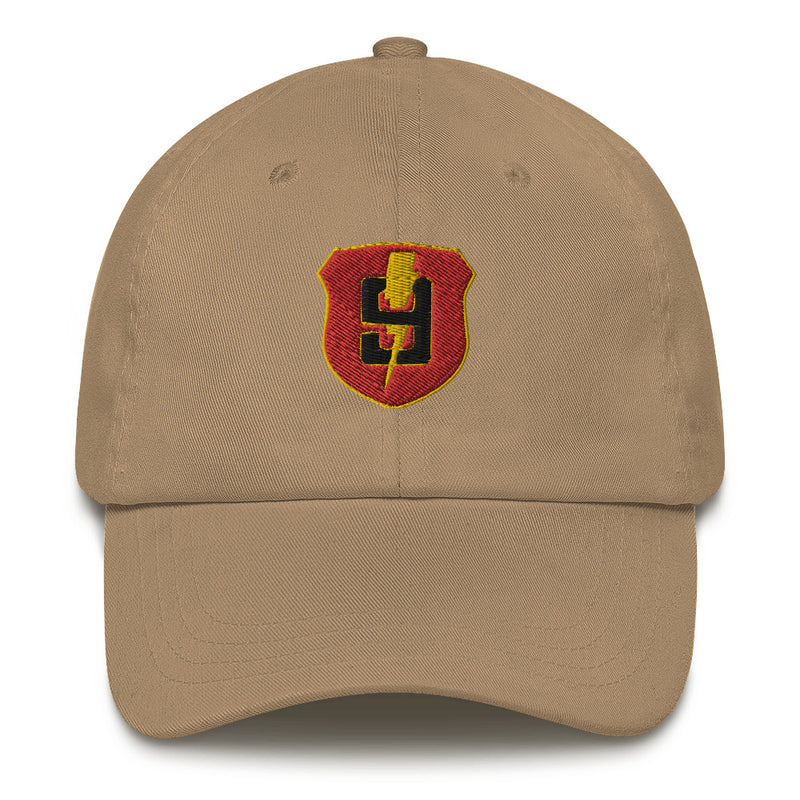 A khaki colored 9th Regiment Hat with the logo on the front.  The hat has a curved visor and an adjustable strap at the back.
