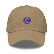 A khaki colored Navy Seabees Hat with the logo on the front.  The hat has a curved visor and an adjustable strap at the back.
