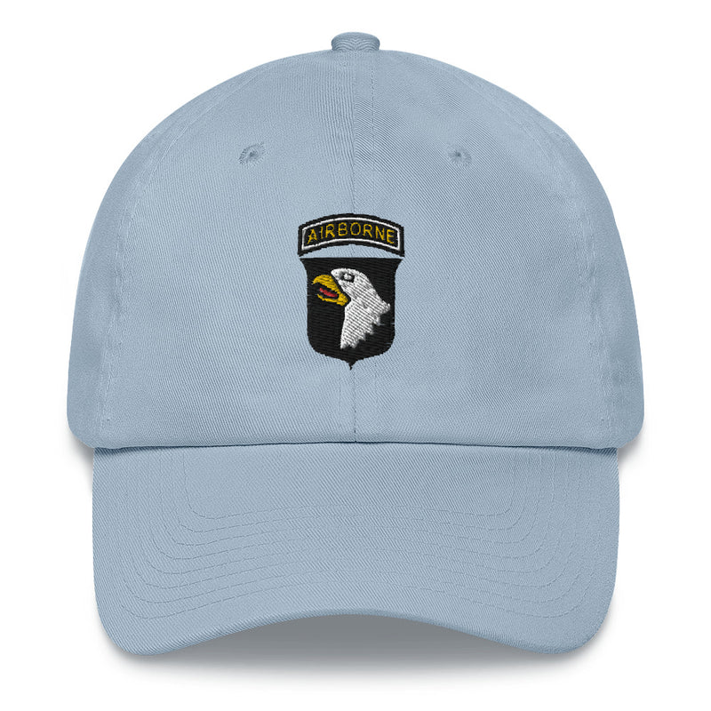 A light blue 101st Airborne Hat with the logo on the front.  The hat has a curved visor and an adjustable strap at the back.