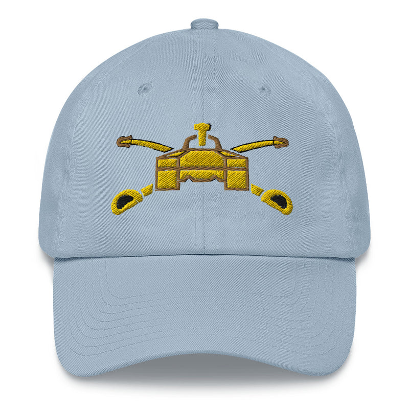 A light blue Army Armor Hat with the logo on the front.  The hat has a curved visor and an adjustable strap at the back.