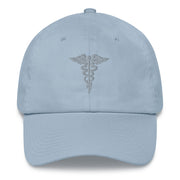 A light blue Hospital Corpsman Hat with the logo on the front.  The hat has a curved visor and an adjustable strap at the back.