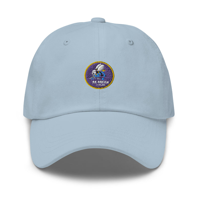 A light blue Navy Seabees Hat with the logo on the front.  The hat has a curved visor and an adjustable strap at the back.