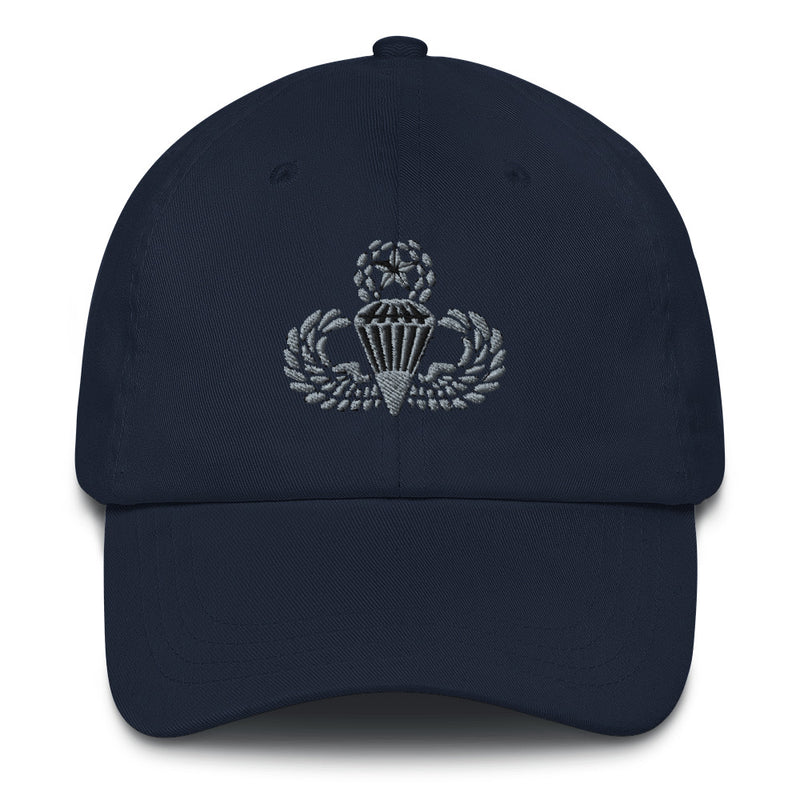 A navy blue Master Parachutist Hat with the logo on the front.  The hat has a curved visor and an adjustable strap at the back.