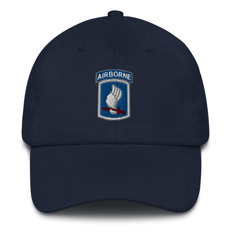 A navy blue 173rd Airborne Brigade Hat with the logo on the front.  The hat has a curved visor and an adjustable strap at the back.