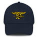 A navy blue  Navy Seals Hat with the logo on the front.  The hat has a curved visor and an adjustable strap at the back.