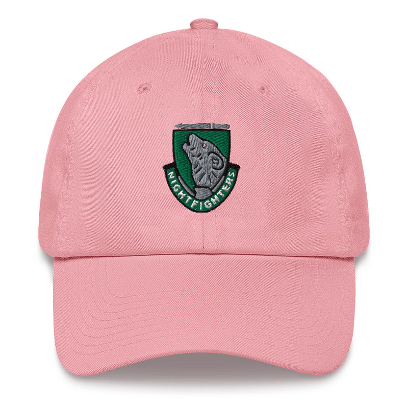 A pink 104th Infantry Division Hat with the logo on the front.  The hat has a curved visor and an adjustable strap at the back.