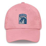 A pink XVIII Airborne Corps Hat with the logo on the front.  The hat has a curved visor and an adjustable strap at the back.