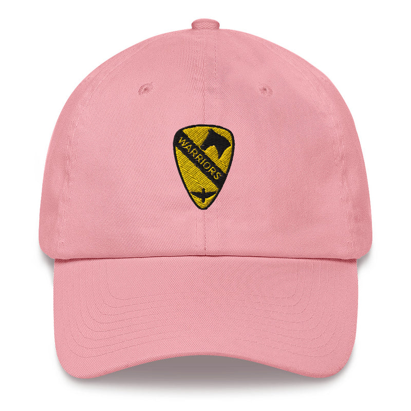 A pink 1st Air Cavalry Brigade Hat with the logo on the front.  The hat has a curved visor and an adjustable strap at the back.