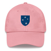 A pink 23rd Infantry Division Hat with the logo on the front.  The hat has a curved visor and an adjustable strap at the back.