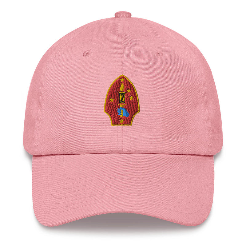 A pink 2nd Marine Division Hat with the logo on the front.  The hat has a curved visor and an adjustable strap at the back.