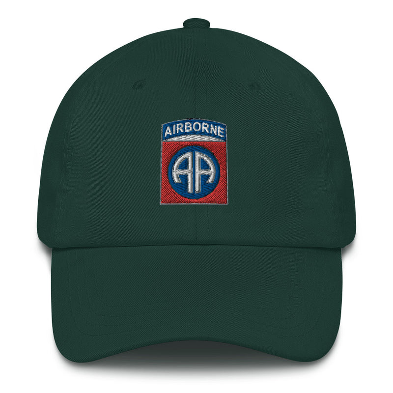 A spruce colored 82nd Airborne Hat with the logo on the front.  The hat has a curved visor and an adjustable strap at the back.