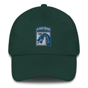 A spruce colored XVIII Airborne Corps Hat with the logo on the front.  The hat has a curved visor and an adjustable strap at the back.